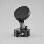 Luminomo Anchor black magnetic suction phone mount in minimalist studio setup