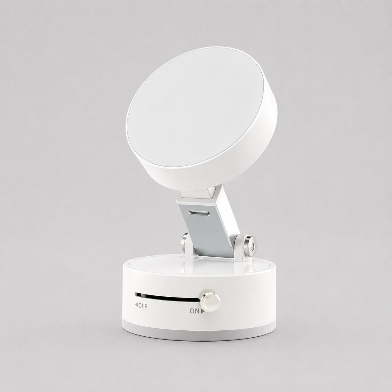 Luminomo Anchor white magnetic suction phone mount on neutral gray background