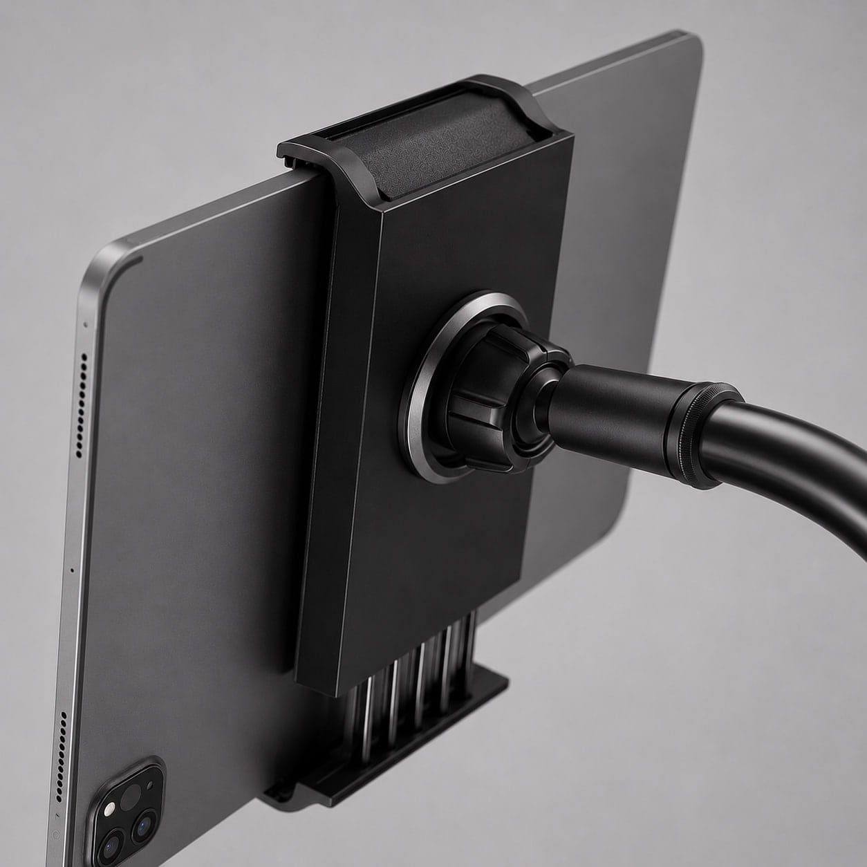 Close-up detail shot of Luminomo Arc secure tablet grip and hinge