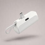Studio product photo of the white Luminomo Go 10000mAh portable power bank with built-in USB-C connector.