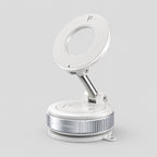 Frost colored Luminomo Orbit magnetic phone mount with adjustable arm and suction base displayed on a clean light gray background.